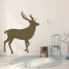 Wall sticker deer 2483 - Room decor with light walls, wooden floor, and blue chair.