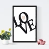 Love 132 poster - Graphic design with large L, O, V, E letters and a heart in the center. Black on a white background.