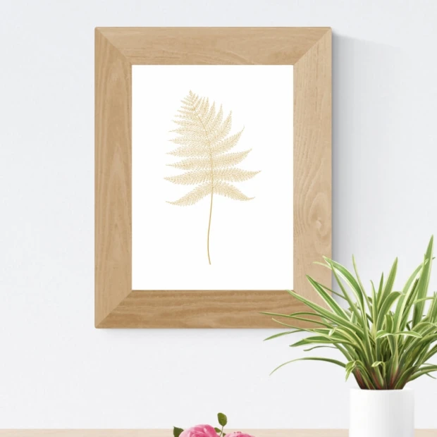 Leaf poster 198 - Graphic design. Golden leaf on a white background with delicate details and a symmetrical shape.