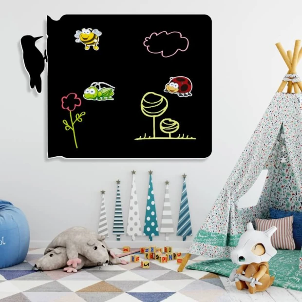 Chalkboard magnetic board for kids, woodpecker design - arranged in a bright children\'s room corner.
