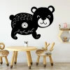 Painting template bear 2494 - Decor for a child\'s room. Light walls and wooden furniture.