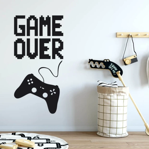 Kids\' wall sticker Game Over 2495 - Graphic design with black GAME OVER text and game controller outline.