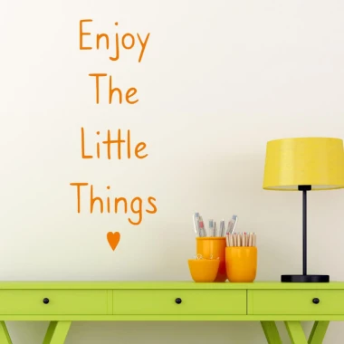 Wall sticker "Enjoy the little things" 2499 - Room decor with light-colored wall, green table, and yellow lamp.