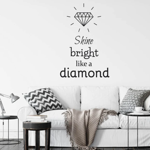 Shine bright like a diamond painting template 2496 - Living room setup with light walls and a sofa with geometric pillows.