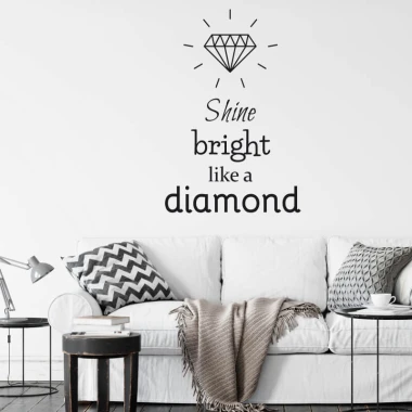 Shine bright like a diamond painting template 2496 - Living room setup with light walls and a sofa with geometric pillows.