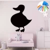 Chalkboard sticker for kids featuring a duck - perfect for a child\'s room with light walls and pastel furniture.