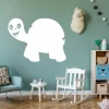 Dry-erase board turtle 366 - Decorated in a children\'s room with green walls, light furniture, and toys.