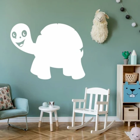 Dry-erase board turtle 366 - Decorated in a children\'s room with green walls, light furniture, and toys.