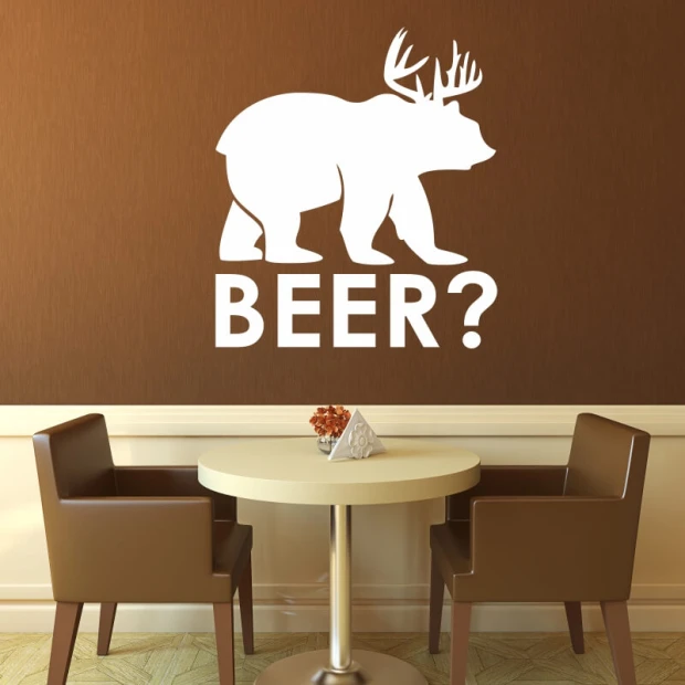 Wall sticker beer? 2503 - Dining room decor. Brown walls, table with white tablecloth, and chairs in a matching shade.
