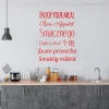 Wall sticker "Smacznego 2517" - Kitchen decor with gray furniture, white walls, and a minimalist style.