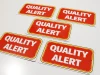 Custom magnetic mat - Graphic design. Red background with white &amp;quot;QUALITY ALERT&amp;quot; text in rectangular frames.