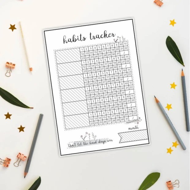 Magnetic dry-erase habits tracker board 463 - Graphic design with a grid of numbered days and plant elements.