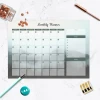 Monthly planner dry-erase board 466 - Simple grid with days of the week and sections for goals.
