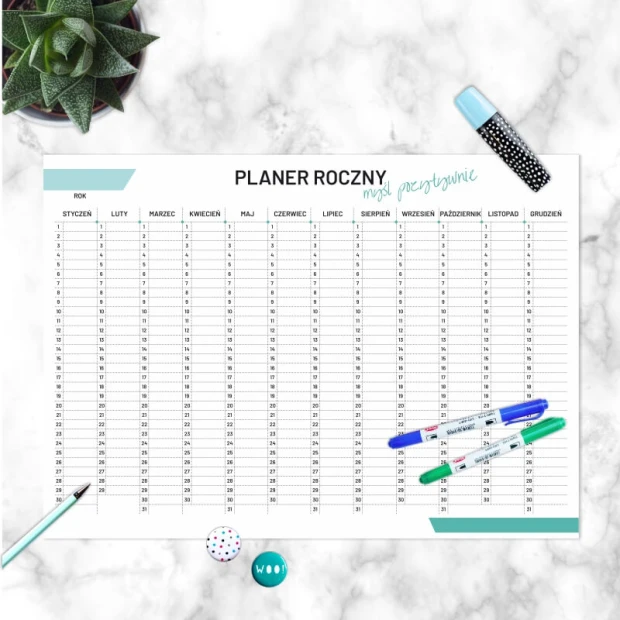 Yearly planner whiteboard 474 - Graphic design. Simple grid with months and days, colorful text and symbols.