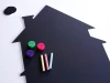 Chalkboard magnetic board in house shape with chimney, includes colorful chalks and magnets.