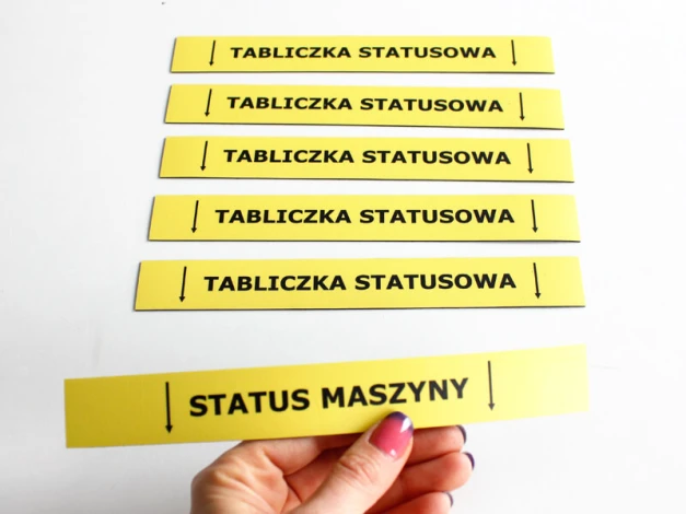 Custom printed magnet measuring 19.5x2.5 cm - Graphic design with yellow background and black text STATUS SIGN.