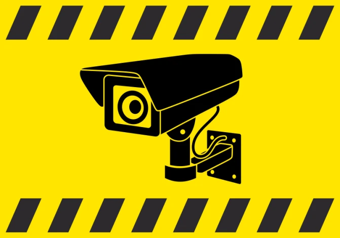 Camera sticker - Graphic design. Black camera on yellow background with black warning stripes.