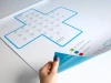 Magnetic dry-erase board safety cross 126 - Graphic design featuring a cross with a grid pattern.