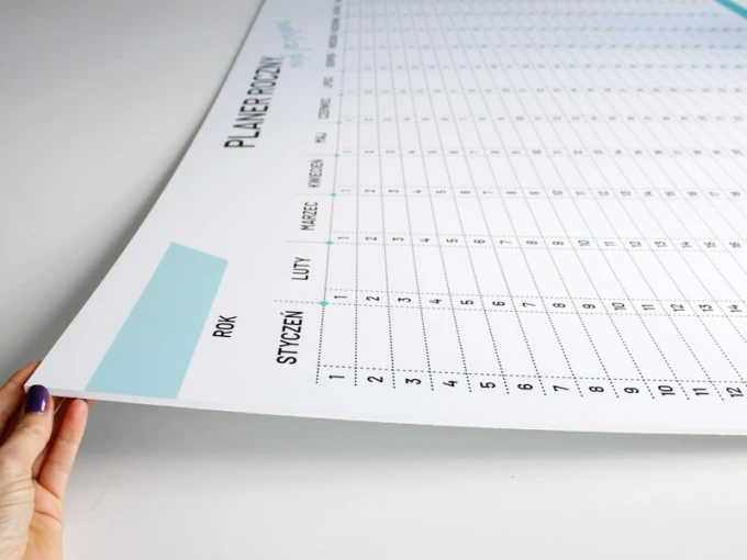 Yearly planner whiteboard 474 - Graphic design. Simple grid with months and days in pastel colors.