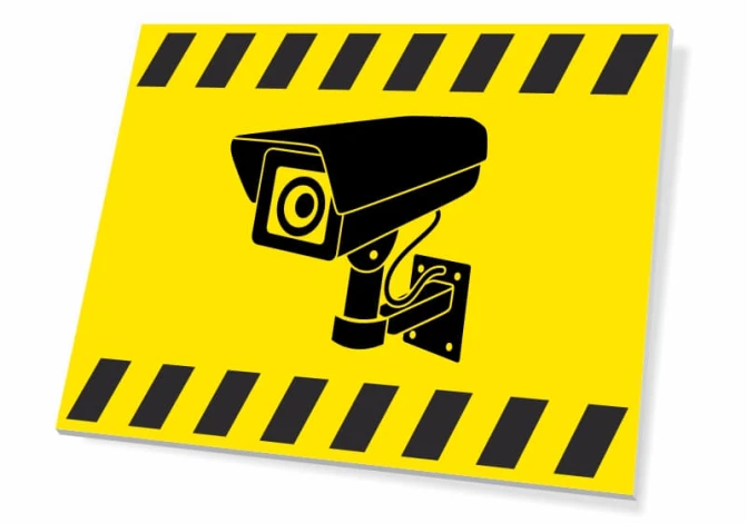 Camera sign - Graphic design. Yellow background with a black camera and warning stripes.