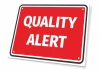 Quality alert sign - Graphic design. Red background with large white text reading QUALITY ALERT.