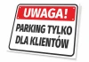 Attention sign: parking for customers only - simple design with red background and white text.