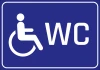 WC sticker for disabled individuals - Graphic design featuring a wheelchair user next to the WC label.
