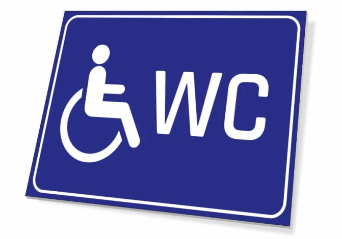 WC sign for disabled individuals - Graphic design with blue background, white wheelchair icon, and WC text.