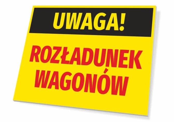 Warning sign for unloading wagons - Graphic design. Yellow background, black and red text, rectangular shape.