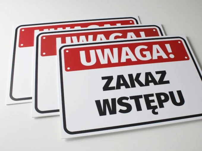 Warning: No Entry Sign - Rectangular sign with a red background and large white text.