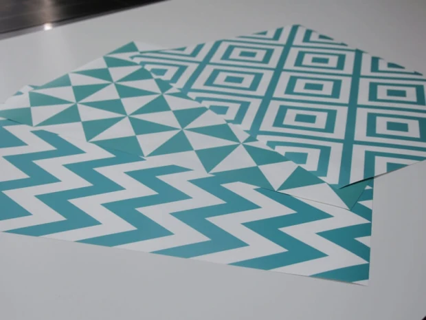 Custom large wall sticker - Graphic design with turquoise triangles and rectangles.