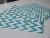 Custom large wall sticker - Graphic design with turquoise triangles and rectangles.