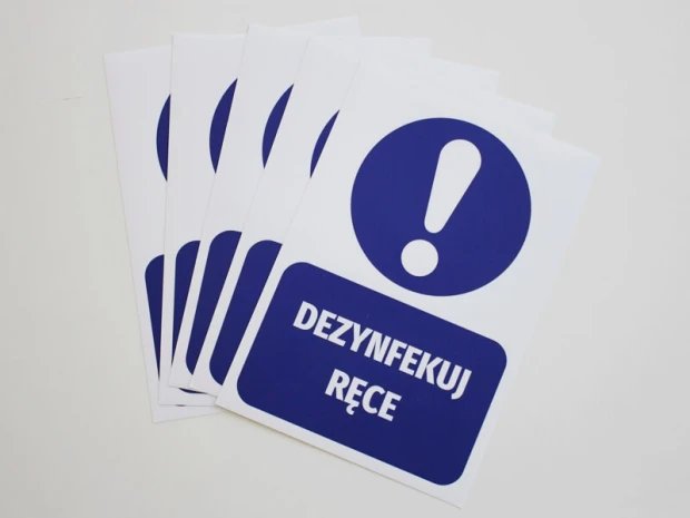 Hand Sanitizer Sticker - Graphic design featuring a blue circle with an exclamation mark and the text SANITIZE HANDS.
