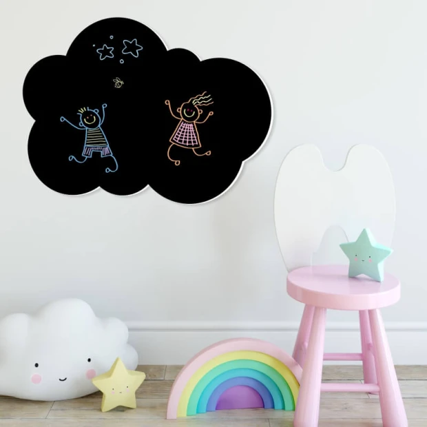 Chalkboard magnetic cloud board for kids - Styled in a bright children\'s room with simple furniture.