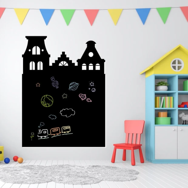 Chalkboard magnetic board houses 246 - Decor in a children\'s room with light-colored walls and colorful garlands above.