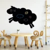 Chalkboard magnetic board sheep 348 - Decor in a child\'s room with light-colored walls and wooden furniture.