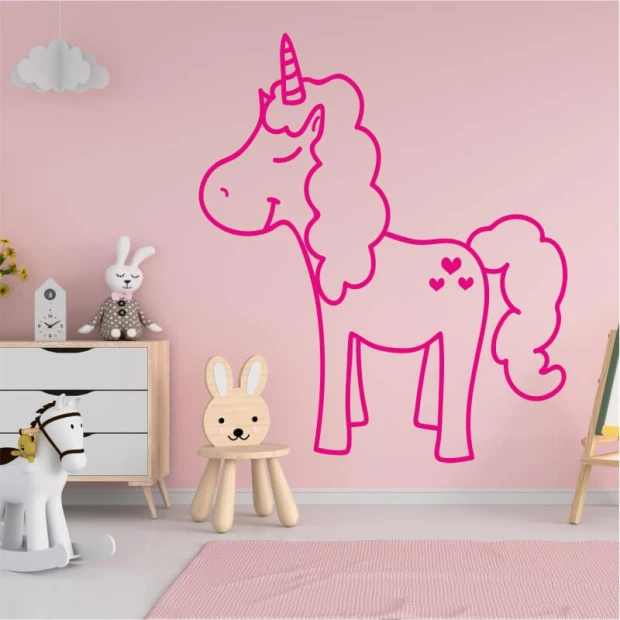Unicorn wall sticker for kids 2545 - Decorates a child\'s room with pink walls and light-colored furniture.
