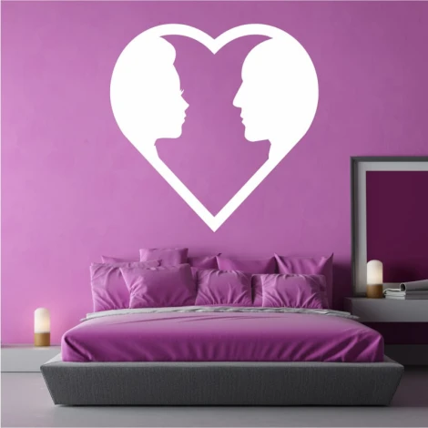 Heart wall sticker 2523 - Bedroom decor with purple walls and a bed adorned with pink pillows.