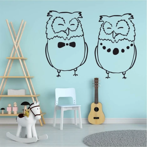 Owl wall sticker 2549 - Decor for a child\'s room with light walls, wooden furniture, and toys.