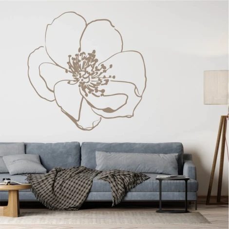 Flower painting stencil 2552 - Living room setup with light walls and large flower graphic above a gray-blue sofa.