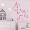 Unicorn wall template for kids 2545 - Brightly colored walls and pastel furniture in a children\'s room.