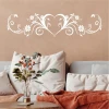Heart ornament wall template 2524 - Living room arrangement. Beige walls, light-colored furniture.