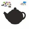Chalkboard magnetic board for kitchen, teapot design with colorful magnets and chalks.
