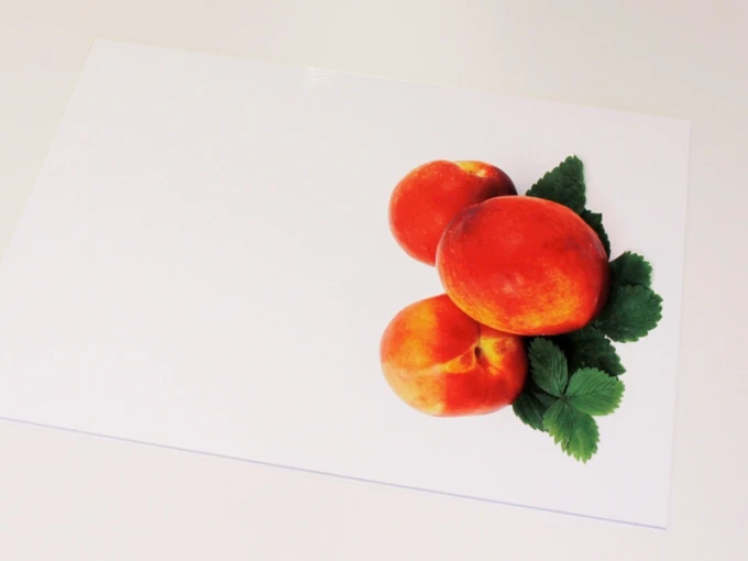 Peach-themed dry-erase board for the kitchen featuring three peaches on a white background with green accents.