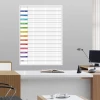 Magnetic dry-erase board lean 040 annual planner - Office setup with light-colored walls and furniture in shades.