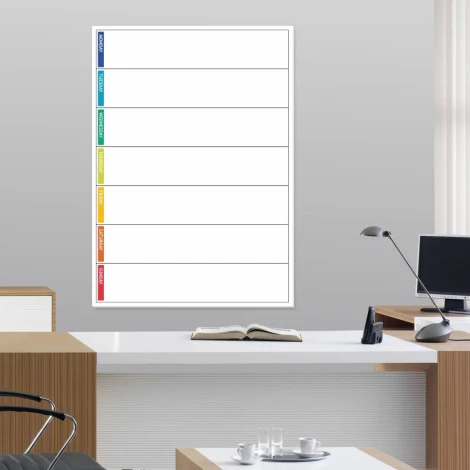 Magnetic dry-erase weekly planner board in English - Office setup with light-colored walls and furniture.