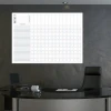 Magnetic dry-erase competency matrix board 135 - Office setup with dark walls, modern design.