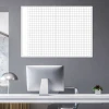 White dry-erase magnetic board with a fine grid pattern for lean planning.