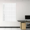 Magnetic dry-erase board, annual lean planner in English, ideal for office decor with light-colored walls.