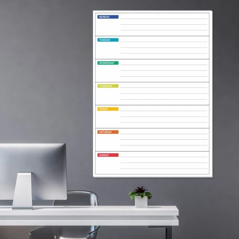 Weekly lean planner dry-erase board 045 - Office setup with gray walls and modern furniture.
